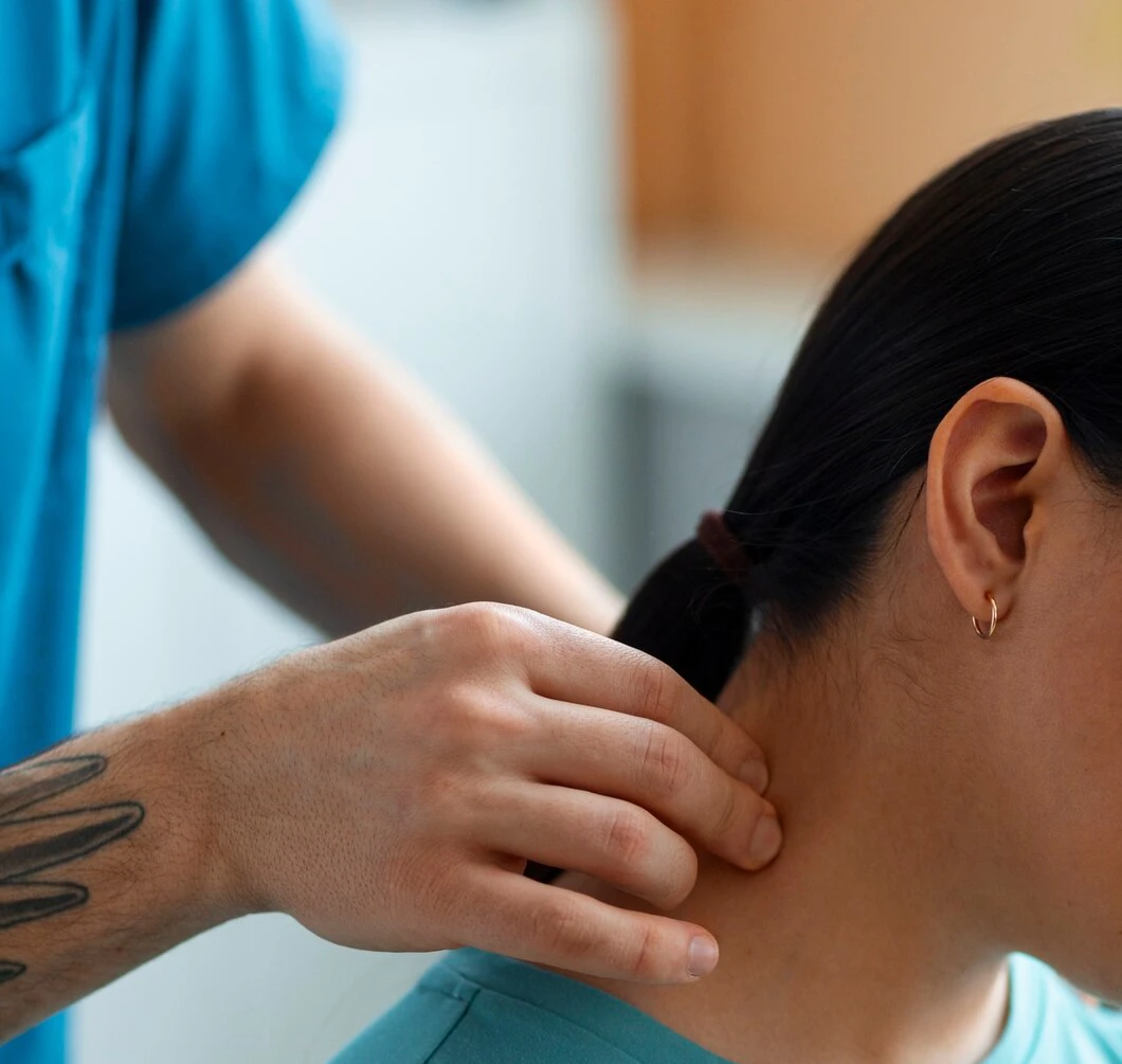 Physiotherapist treating patient